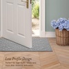 image:imageLaura Ashley HiLow Tufted 26 x 60 Washable SkidResistant Runner Rug  Dusty Navy Feya SolidFeya Solid Light Grey
